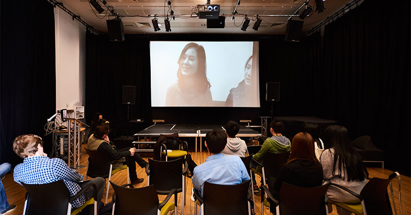 Students watching a film as part of their course
