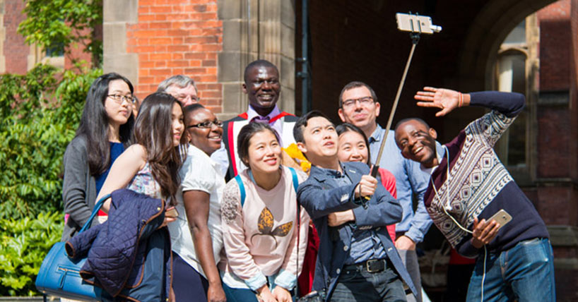 International students in front of The Arches 