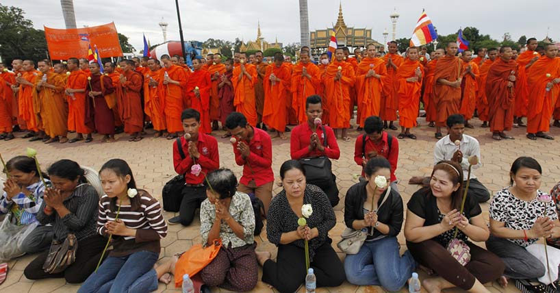 Cambodians pray for peace.