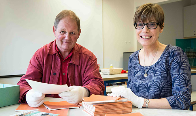 Michael Morpurgo and Sarah Lawrance, Collection and Exhibition Director at Seven Stories, with some of the material from the archive. Picture courtesy of Seven Stories. 