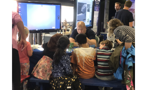 Group of children interacting with the Cell Detectives