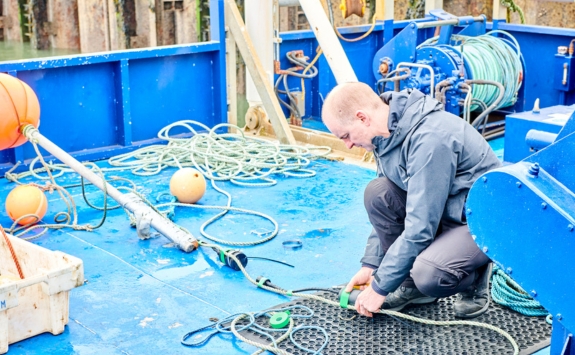 Prof Jeff Neasham from the sensors, electromagnetics and acoustics laboratory (SeaLab) team prepares equipment on the afterdeck of the University