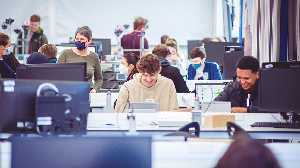 A class of students working on different projects in one of our computer clusters.